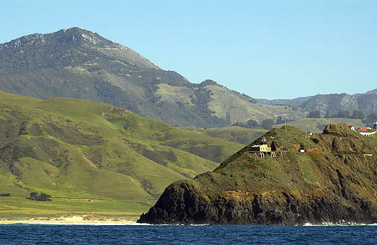 Point Sur Lighthouse as seen from the ocean. Photo by Brock Bradford